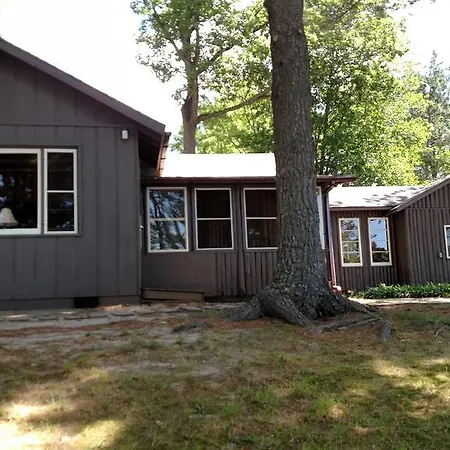 Log Cottage On Blue Lake Kalkaska Exterior photo