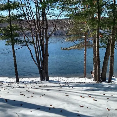 Log Cottage On Blue Lake Kalkaska Exterior photo